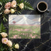 Nature-inspired bedroom wall featuring a soft mountain range and pink floral meadow mural