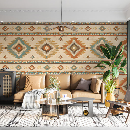 Living room featuring southwestern geometric wallpaper behind a leather sofa