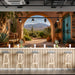 A bright bar decorated with the desert archway mural and warm wood accents.