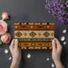 Bohemian style dining room with desert-inspired geometric wall mural