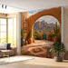 A living room featuring the desert mural on a feature wall with leather furniture.