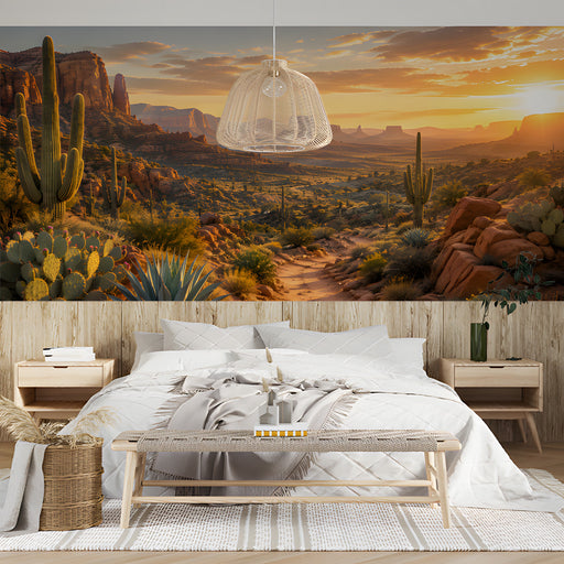 A tranquil bedroom space featuring a desert sunset mural on the wall behind a bed with neutral linens.