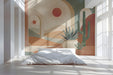 A cozy bohemian bedroom with a sun-drenched desert mural wall and linen bedding.