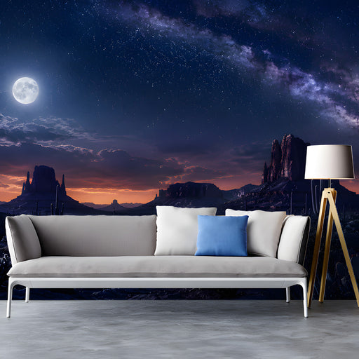 Home cinema wall showing a vast desert night sky mural, creating a deep and inspiring backdrop for a workspace.