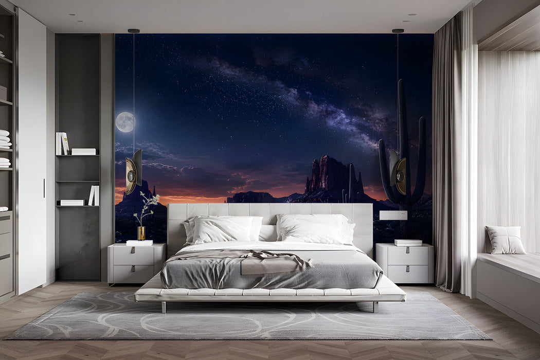 Bedroom with a starlit desert mural wall, mid-century furniture, and warm ambient floor lamp lighting.