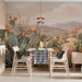 The desert mural installed as an expansive feature wall in a sunlit dining room with neutral linen furniture.