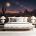 A bedroom featuring the desert night landscape as an inspiring accent wall.