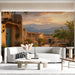A warm home office environment with a Southwestern mural, enhancing the creative and earthy atmosphere.