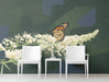 A tranquil entryway wall featuring a butterfly and botanical geometric mural