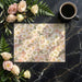 Blush meadow wallpaper in a cozy dining room with white tableware
