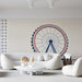 A bright, modern commercial space featuring the Ferris wheel mural on the main wall behind a bed.
