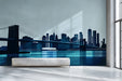 A modern hallway featuring the navy blue city skyline mural on the main wall.