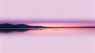 Abstract minimalist sunset wallpaper featuring a smooth gradient from pale lilac to vibrant rose with mountain silhouettes