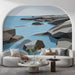 Geometric rock wall mural behind a modern wooden desk in a home office.