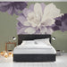 Soft floral mural wall decor in a bright bedroom with white accents