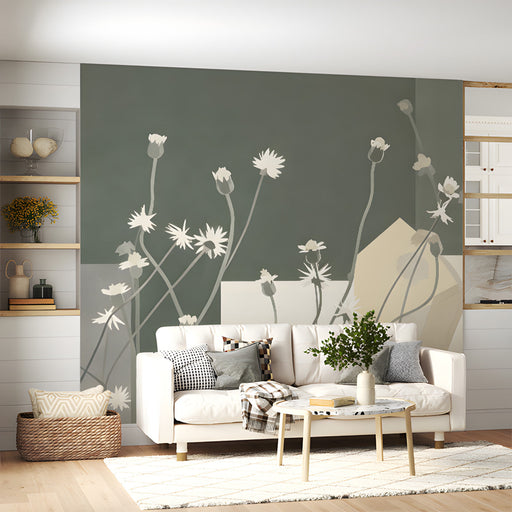 Botanical art mural behind a reading chair in a bright, airy living room nook.