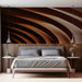 Bedroom interior featuring a terracotta curved line mural behind a walnut sideboard.