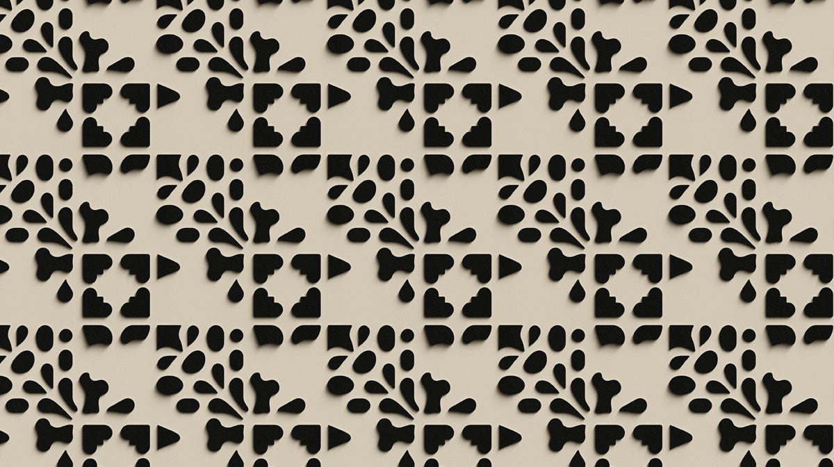 Geometric wallpaper pattern with charcoal organic shapes and stepped blocks on a neutral warm beige background.