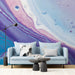 Sophisticated living room interior with a colorful swirling abstract wall mural
