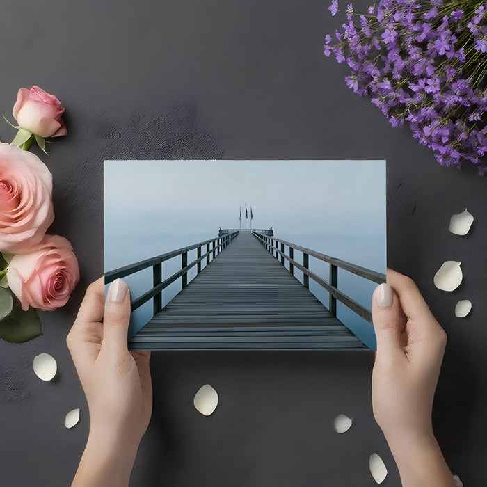 A quiet minimalist bedroom interior with a calming ocean pier mural as a backdrop.
