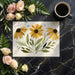 A cozy nursery featuring a hand-painted style floral wall mural with soft yellow flowers.