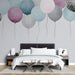 Bright bedroom wall with floating balloon wallpaper design in watercolor style