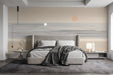 Watercolor horizon mural installed in a bright modern bedroom with neutral linen furniture