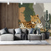 Safari inspired wallpaper in a living room with neutral bedding and minimalist decor