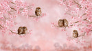 A soft pink mural featuring flowering cherry blossom branches and small brown owls perched on twigs.