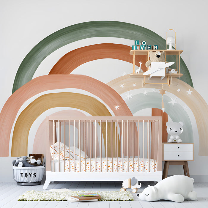 Boho style nursery wall featuring a soft rainbow mural arch pattern