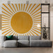 A sunny home office space with a radial gold sunburst mural creating an inspiring backdrop.