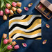 Creative home office with an abstract wave wallpaper creating an energetic backdrop for a desk.