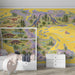 Illustrated dinosaur world wall mural in a creative nursery featuring soft textures.