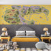 Whimsical dinosaur map wallpaper installed in a colorful boy's bedroom with wooden furniture.