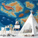 Ocean map wallpaper design featured on an playroom wall behind a modern minimalist space.