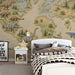 A bedroom corner decorated with a prehistoric world map mural and educational wooden toys.