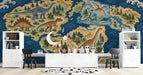 Dinosaur world map mural installed in a child's bedroom with wooden furniture and neutral bedding.