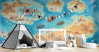 A creative bedroom wall featuring an ancient marine map mural with wooden desk and bookshelves.
