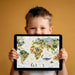 Detailed map wallpaper in a study room featuring a desk and vintage globe