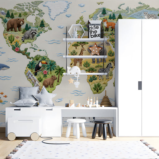 Educational animal map mural in a child's study with colorful soft toys
