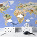Detailed world map mural in a creative playroom with colorful storage bins and kids desk