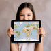 Educational animal map wallpaper feature wall in a bright modern playroom