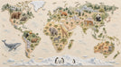 A textured world map mural with illustrated wildlife like giraffes, bears, and penguins on a sandy background.