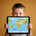 Kids playroom with a vibrant geometric world map mural above a toy storage area