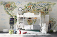 A bedroom wall decorated with an educational animal world map mural featuring soft tones.