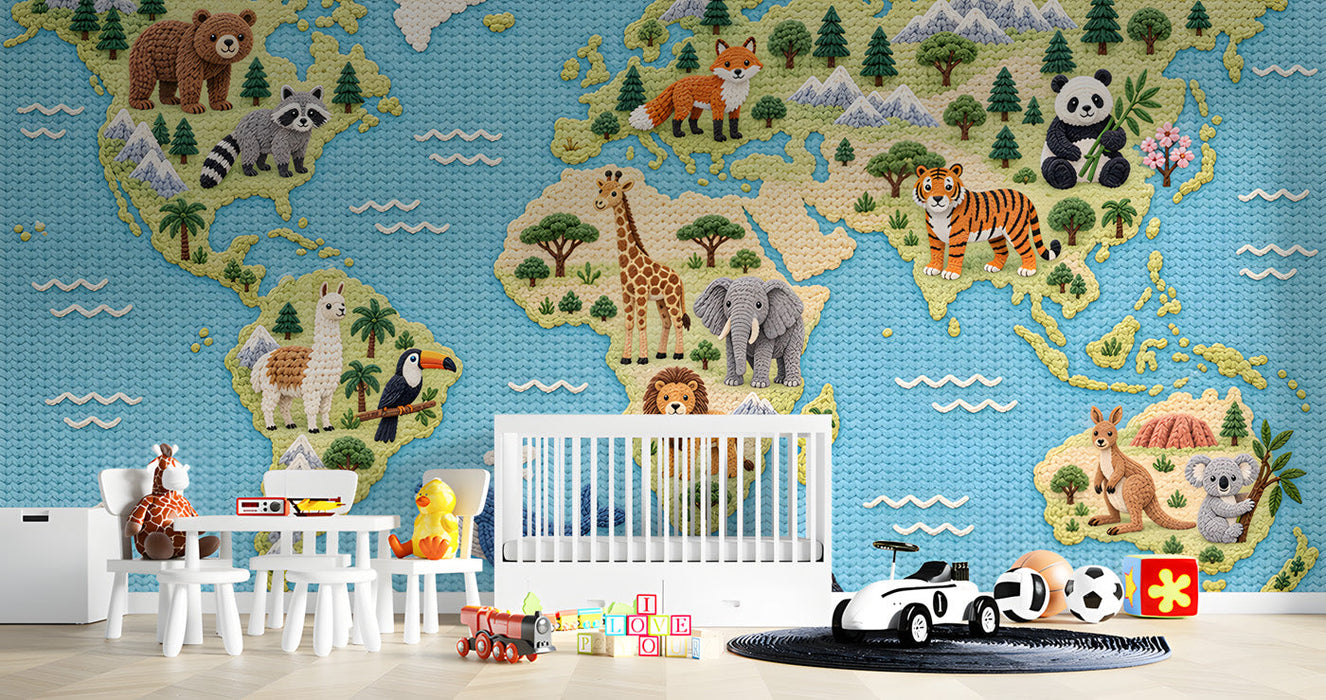 Knitted world map wall mural in a colorful nursery room with wooden crib