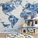 World animal map mural installed in a bright modern nursery room