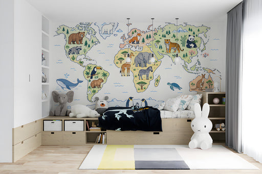 World map mural installed in a colorful kid's bedroom with wooden toys