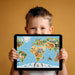 A colorful animal map wall mural featured in a primary school study room with educational bookshelves.