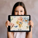 Educational animal map wallpaper feature wall in a bright, modern nursery room.